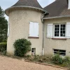 La tourelle de la maison à Orgeval après la pose de nouvelles gouttières, montrant une amélioration esthétique et fonctionnelle.